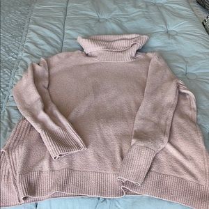 pink turtleneck sweater